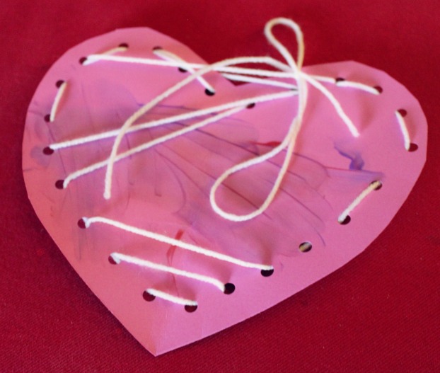 Painting and Lacing Hearts for Preschool Kids Celebrating Valentine's Day